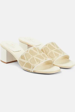 VALENTINO GARAVANI Toile Iconographe 50 raffia-trimmed mules