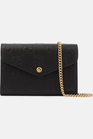 Gucci GG debossed leather wallet on chain
