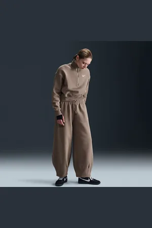 Nike Pants entallados oversized de tiro medio para mujer Sportswear Phoenix Fleece