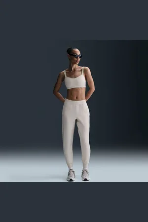 Nike Joggers Dri-FIT de tiro medio para mujer 24.7 ImpossiblySoft