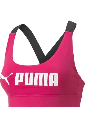 Puma - Training x Stef Fit logo light support sports bra in cream exclusive  to ASOS-Brown