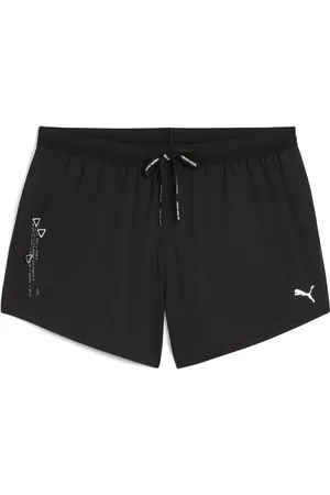 PUMA Pantalones cortos con abertura de 3" para mujer RUN en Talla Chico en Negro |