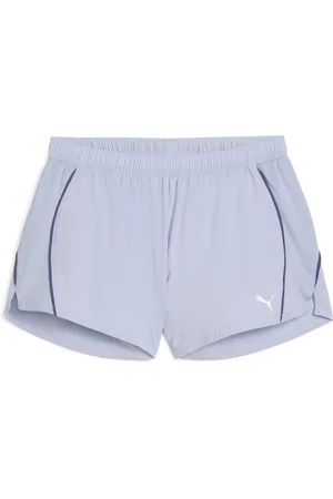 PUMA Shorts de running VELOCITY 7cm para mujer en Talla Chico en Azul |