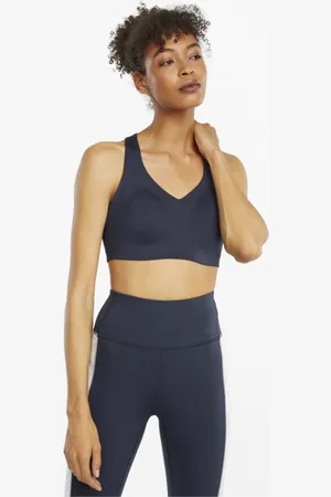 PUMA Top Deportivo para Mujer Alto Impacto en Talle XL