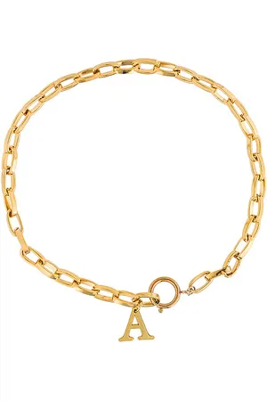 Martha Calvo Collar initial en color oro metálico talla D en - Metallic Gold. Talla D (también en E, I, N, O, P