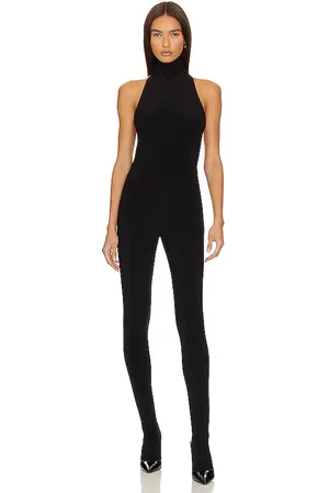 Norma Kamali X revolve halter turtle catsuit with footsie en color talla L en - Black. Talla L (también en M, S, XL).