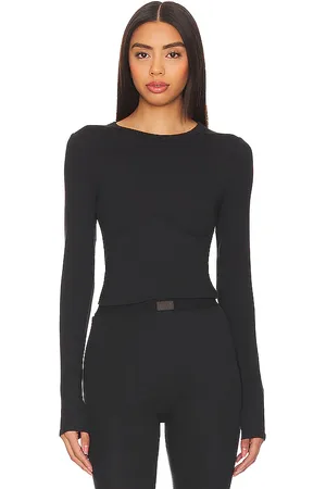 Lunya Manga larga con refuerzo de canalé de modal suave en color negro talla L en - Black. Talla L (también en M, S, XS).