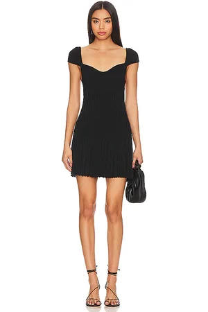 Free People Minivestido cherie en color talla M en - Black. Talla M (también en S).