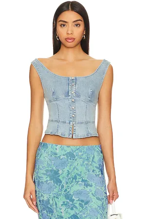 Free People Top corsé sally en color denim claro talla L en - Denim-Light. Talla L (también en M, S, XS).