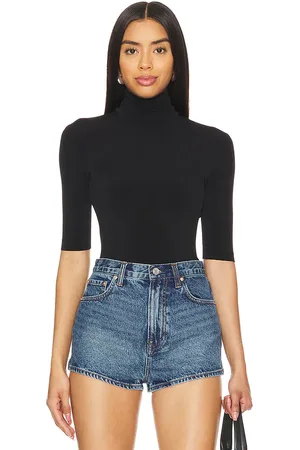 Norma Kamali Slim fit short sleeve turtleneck top en color talla L en - Black. Talla L (también en M, S, XL, XS).