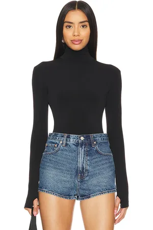 Norma Kamali Slim fit long sleeve turtleneck top en color talla L en - Black. Talla L (también en M, S, XS, XXS).