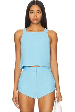 Amanda Uprichard X revolve harley top en color bebe azul talla XL en - Baby Blue. Talla XL (también en L).