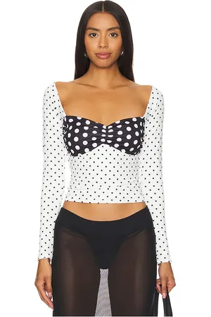 Nii hai Top manga larga polka en color negro, blanco talla L en - Black,White. Talla L (también en M, XL).