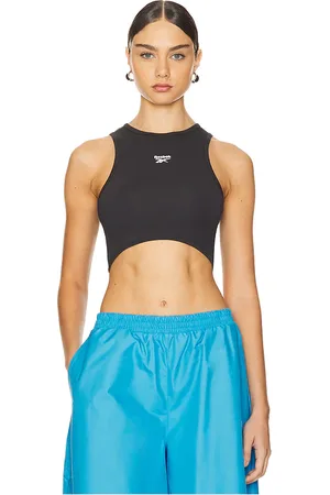 Reebok Top de punto en color negro talla L en - Black. Talla L (también en XL).