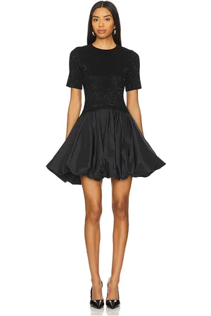 Simkhai Mini vestido con dobladillo abullonado kenz en color talla M en - Black. Talla M (también en S, XS).
