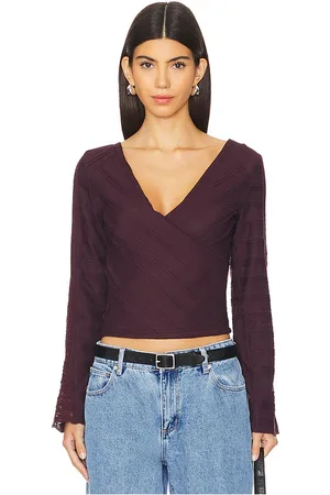 Free People Top manga larga rocky en color vino talla L en - Wine. Talla L (también en M, S, XL, XS).