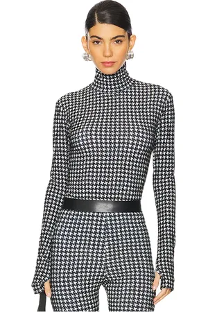 Norma Kamali Slim fit long sleeve turtleneck top en color negro, blanco talla XS en - Black,White. Talla XS (también en