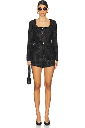 Amanda Uprichard Long sleeve kya romper en color talla M en - Black. Talla M (también en S, XS).