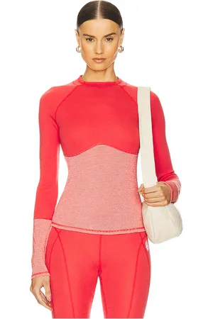 Free People Top manga larga fp movement moonlight base layer en color coral talla L en - Coral. Talla L (también en M, S, XS).