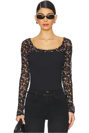 Free People Top manga larga josie en color negro talla M en - Black. Talla M (también en S, XS).