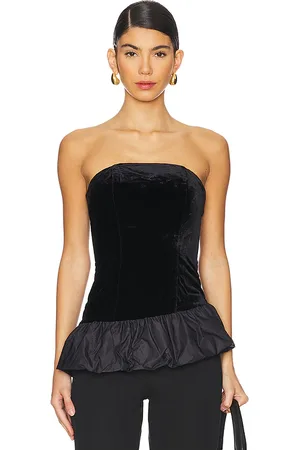 Free People Top abullonado prina en color talla L en - Black. Talla L (también en M, S, XS).