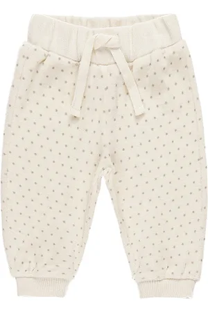 Quincy Mae Pantalón deportivo holgado de terciopelo en color crema talla 12-18M en - Cream. Talla 12-18M (también en 18-24M, 4-5yr).