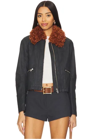 Free People Chaqueta de piel sintética con ribete de piel sintética jayce en color negro talla L en - Black. Talla