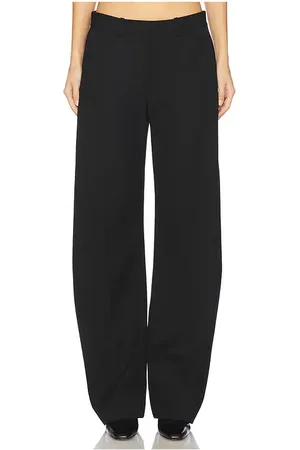 Alexander Wang Pantalón de tiro medio con pierna arqueada mainline en color talla 2 en - Black. Talla 2 (también en 6).