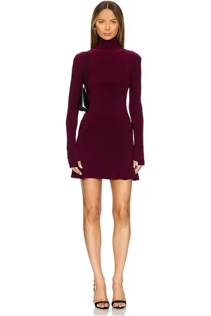 Norma Kamali Vestido mini de cola de pez con cuello alto y manga larga en color morado talla L en - Purple. Talla L (también en M