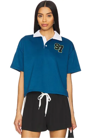 superdown Alinia polo top en color talla L en - Blue. Talla L (también en M, S, XL, XS, XXS).