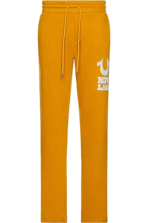 True Religion Pantalón deportivo en color amarillo mostaza talla L en - Mustard. Talla L (también en M, S, XL/1X).