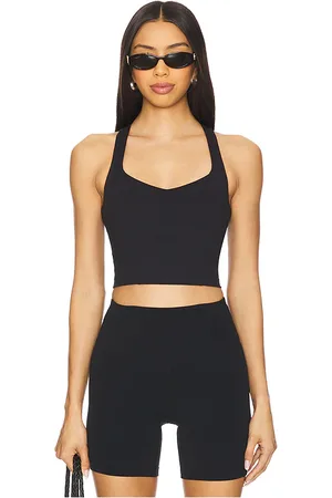 Beyond Yoga Top sin mangas power beyond intensity en color talla L en - Black. Talla L (también en M, S, XS).