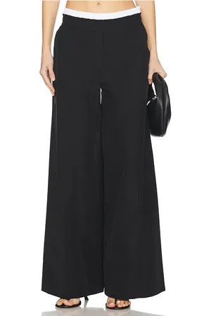 Simkhai Pantalón de doble cinturilla olly en color negro talla M en - Black. Talla M (también en S, XS).