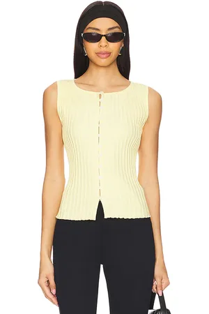 Free People Chaleco tilly en color amarillo talla L en - Yellow. Talla L (también en M, XL).