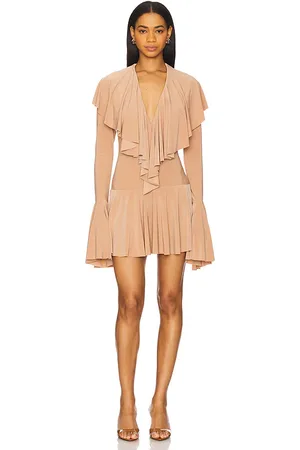 Norma Kamali Vestido corto de manga larga con volantes en color nude talla L en - Nude. Talla L (también en M, S).