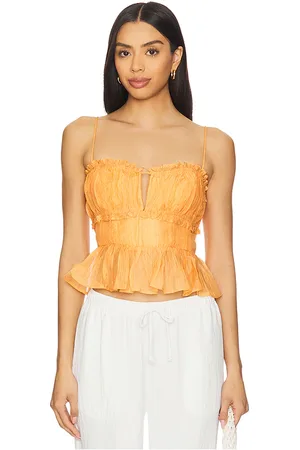 ASTR Top sin mangas top en color naranja talla L en - Orange. Talla L (también en M, S, XS).