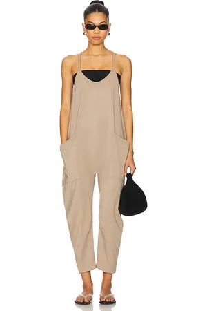 Free People Jumpsuit x fp movement hot shot en color bronce talla L en - Tan. Talla L (también en M, S, XL).