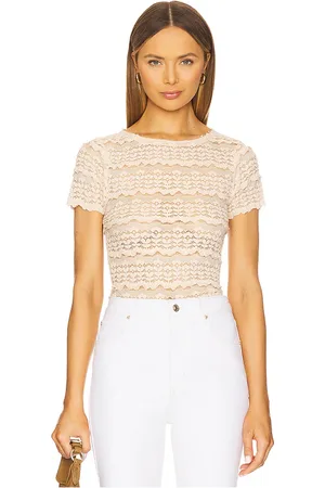 Free People Camiseta encaje angelina en color nude talla L en - Nude. Talla L (también en M, S, XL, XS).