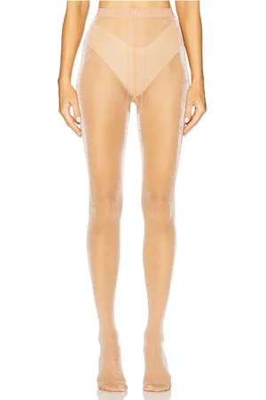 Wolford Medias brillantes en color bronce talla L en - Tan. Talla L (también en M, S, XS).