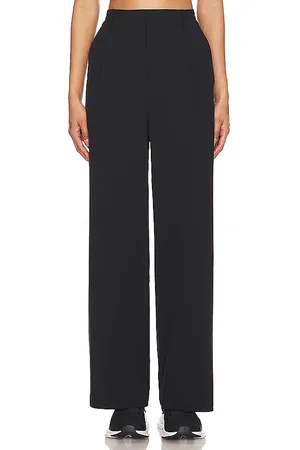 alo Pantalón con trabillas pursuit en color talla M en - Black. Talla M (también en S, XS).