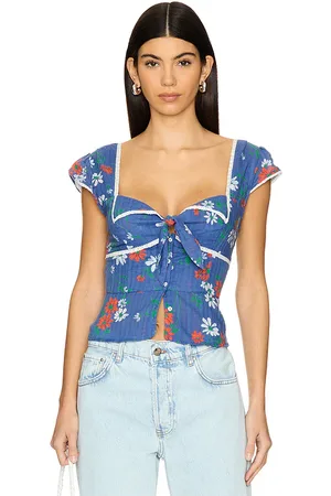 Free People Blusa call me baby en color azul talla L en - Blue. Talla L (también en M).