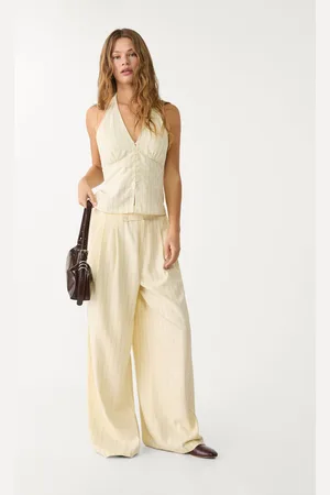 Stradivarius Pantalón fluido pinzas con lino 24
