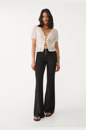 Stradivarius Pantalón flare punto liso 30