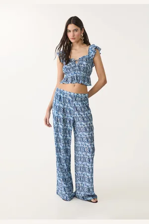 Stradivarius Pantalón fluido palazzo estampado 32