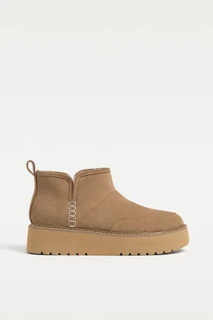 Stradivarius Botines efecto pelo piel 23