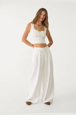 Stradivarius Pantalón fluido pinzas con lino 28
